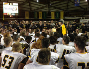 MTU coach Tom Kearly addresses his team after the Miner's Cup game victory - MTU Image