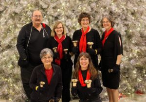 Members of Bells on the Bay participated in The Big Ring, a record-breaking handbell performance on November 19th at the Mall of America. Front row (L to R): Bev Rantanen and Sally Klaasen. Back row (L to R): Woody Gaulke, Robin Henry, Nancy Sailor, and Sherry Cheek.